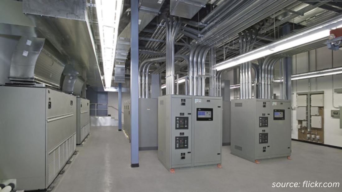 Switchgear cabinets and electrical conduit runs inside a data-center electrical room